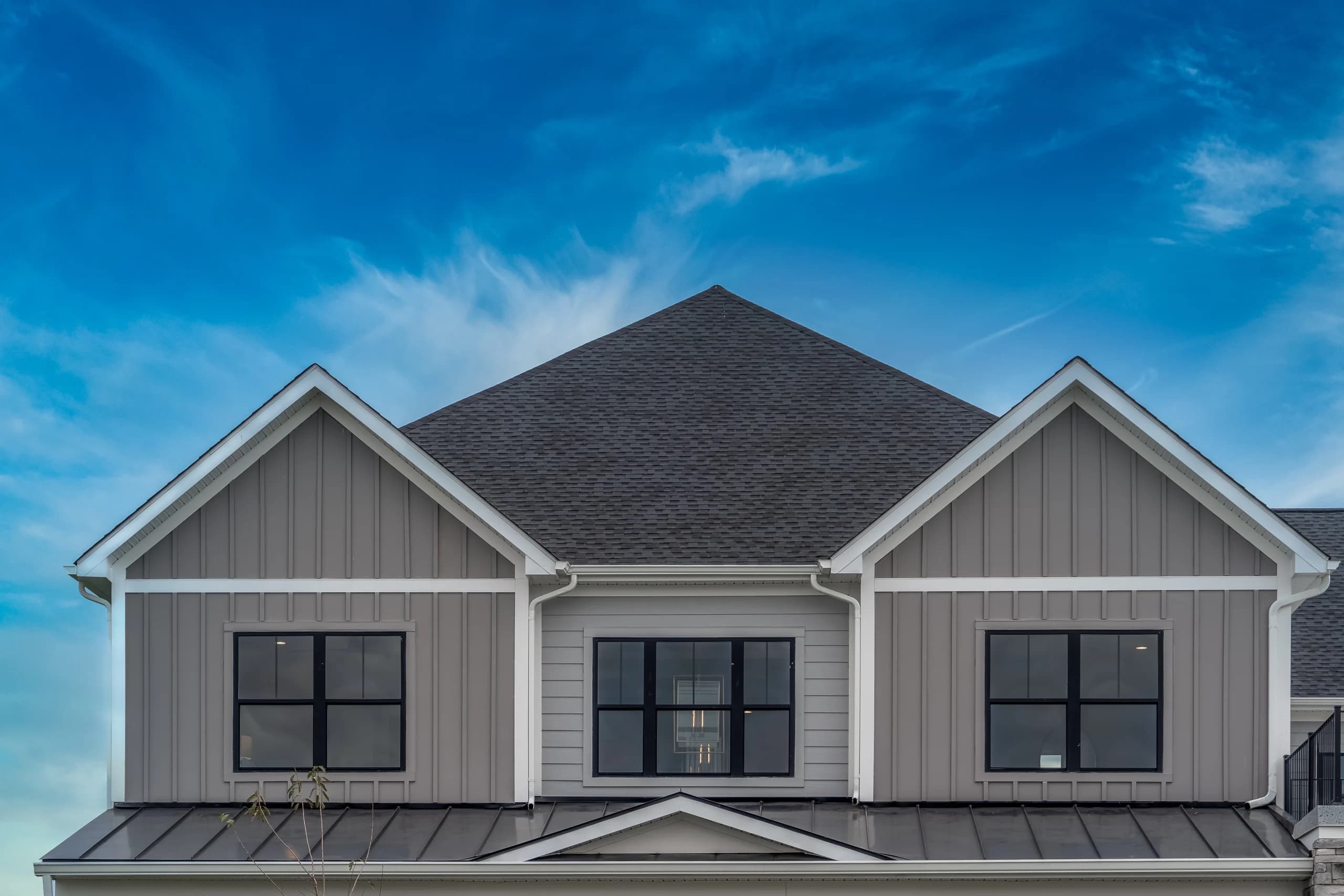 Board and Batten metal siding featured on a modern home.